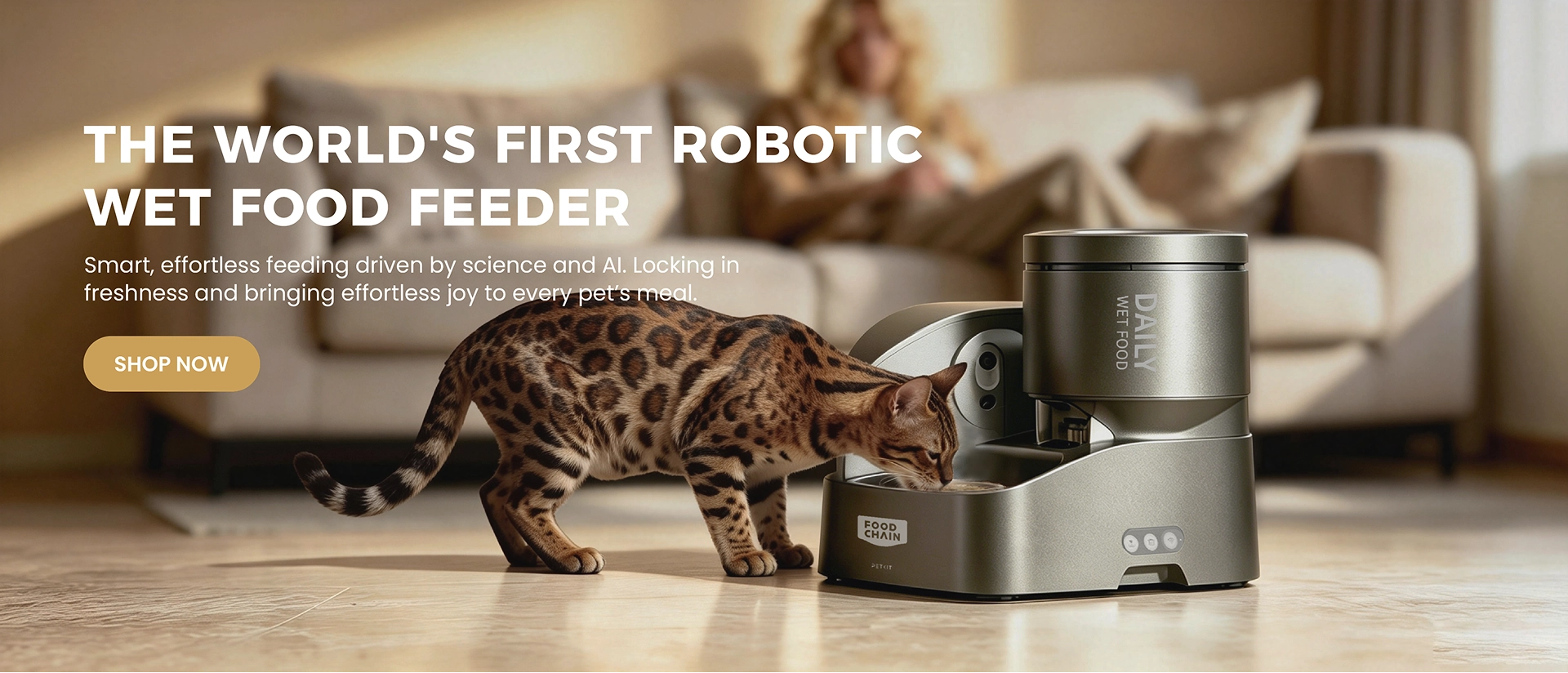 Cat eating wet food from the FOODCHAIN YumShare Daily Feast Smart Robotic Feeder